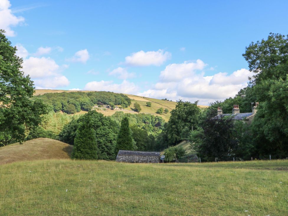 A landscape view with hills and trees at Cragg Hall View in Cragg Vale