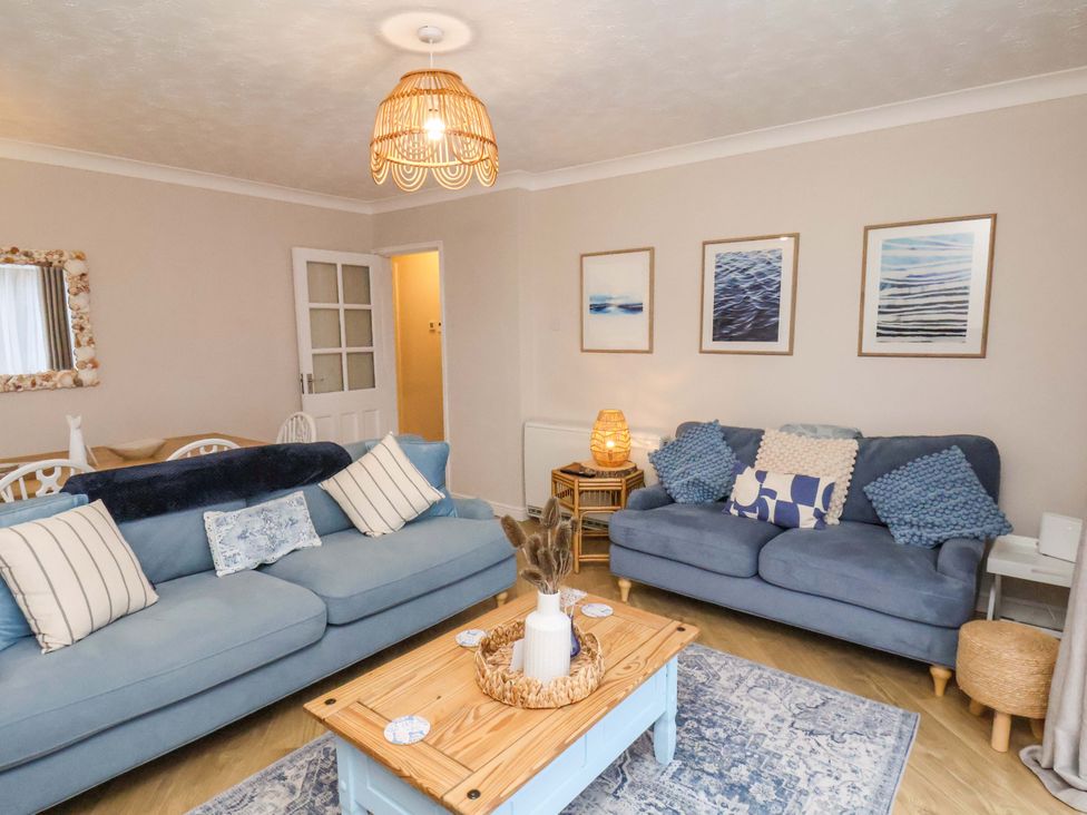 A living room with sofas and a coffee table at Flat 1, 40 Hinderwell Lane