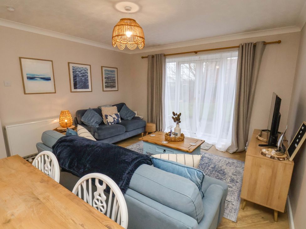 A living room with sofas and a coffee table at Flat 1, 40 Hinderwell Lane