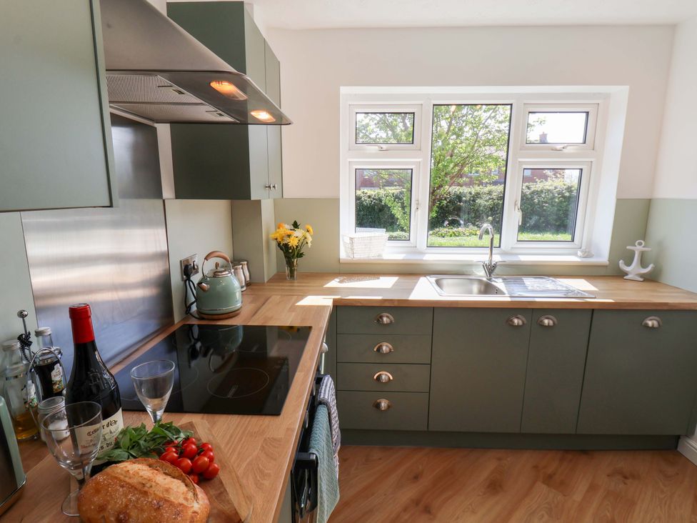 A kitchen with a sink and countertop at Seashells at Runswick Lodge Runswick Bay