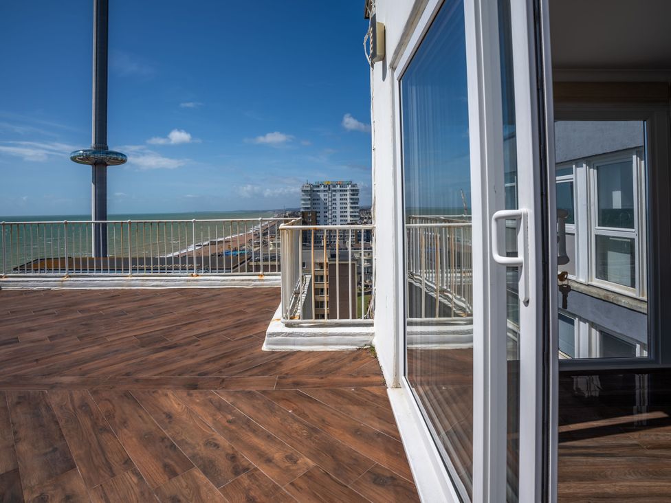 A balcony with a view of the ocean at Beachfront Penthouse in Brighton