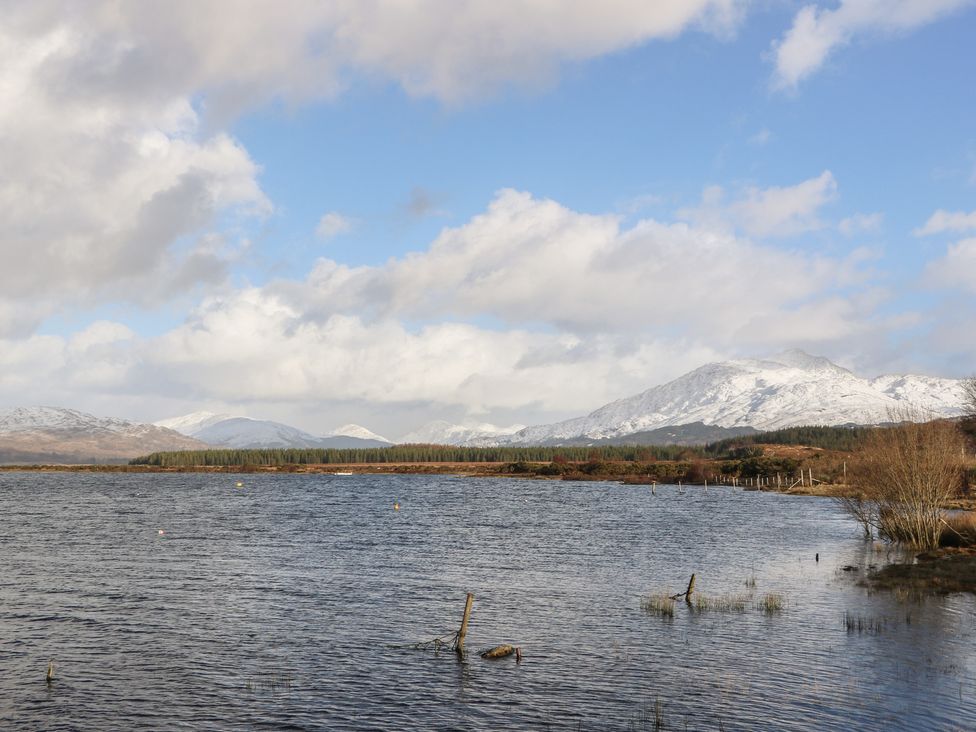 A scenic view of mountains and water at Doire An Daimh