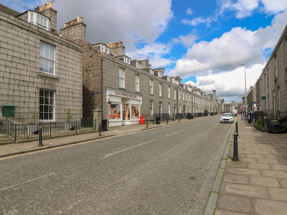 A street with buildings and a shopfront at Pincerna Apartment Suite 1a in Aberdeen