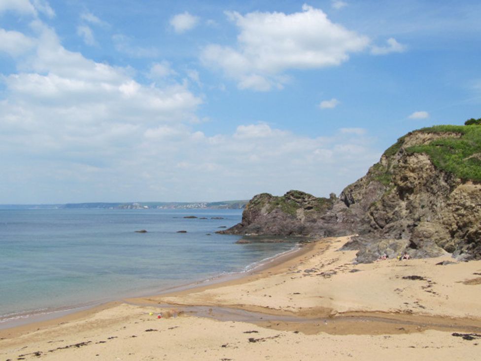 A beach with sand and rocks at Hope Cove near Kingsbridge