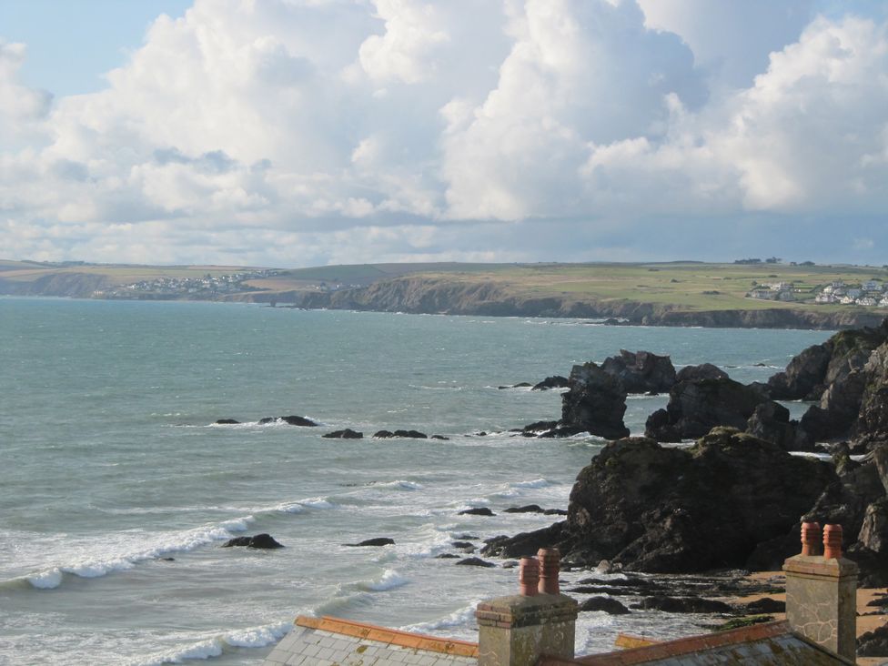 A coastal view with rocks and waves at Hope Cove near Kingsbridge