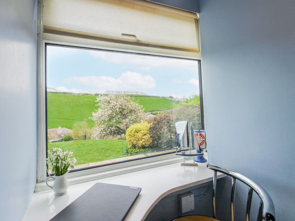 A home office with a window and desk at Quay Sands, Hope Cove