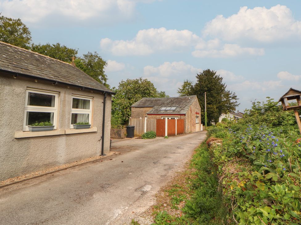 A house with a garage and garden at Little Plumtree in Milnthorpe