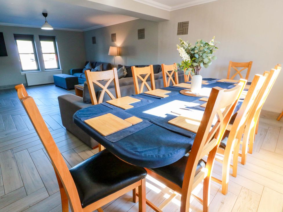 A dining room with a table and chairs at Ledrishmore View in Alexandria