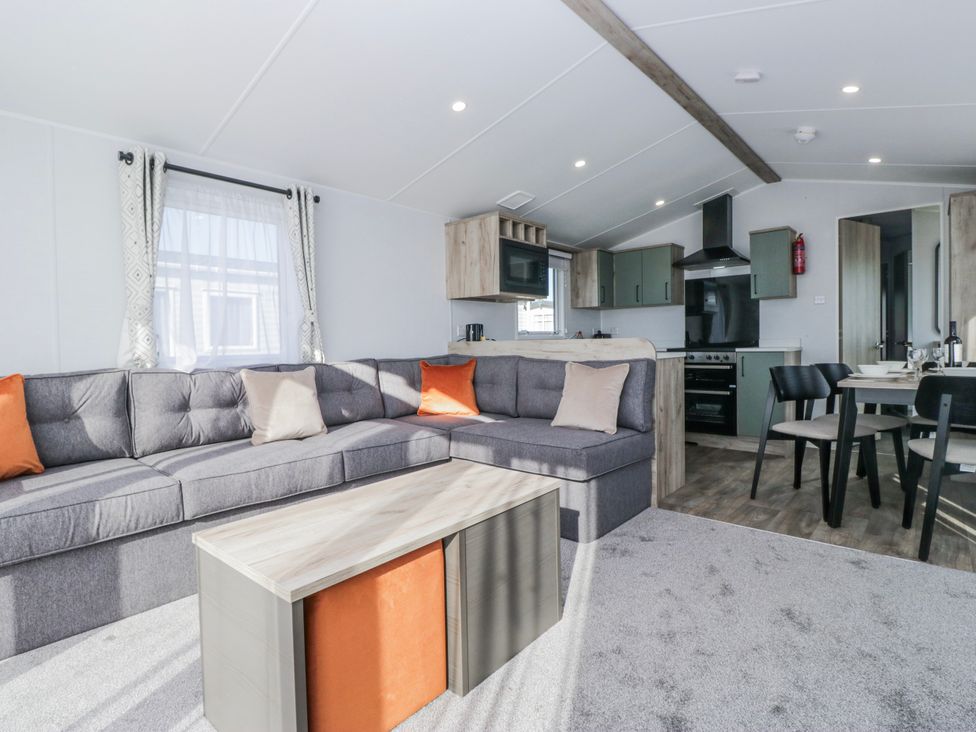 A living room with a sofa and coffee table at Willerby High End Brand S6 (on Coniston) St Bees