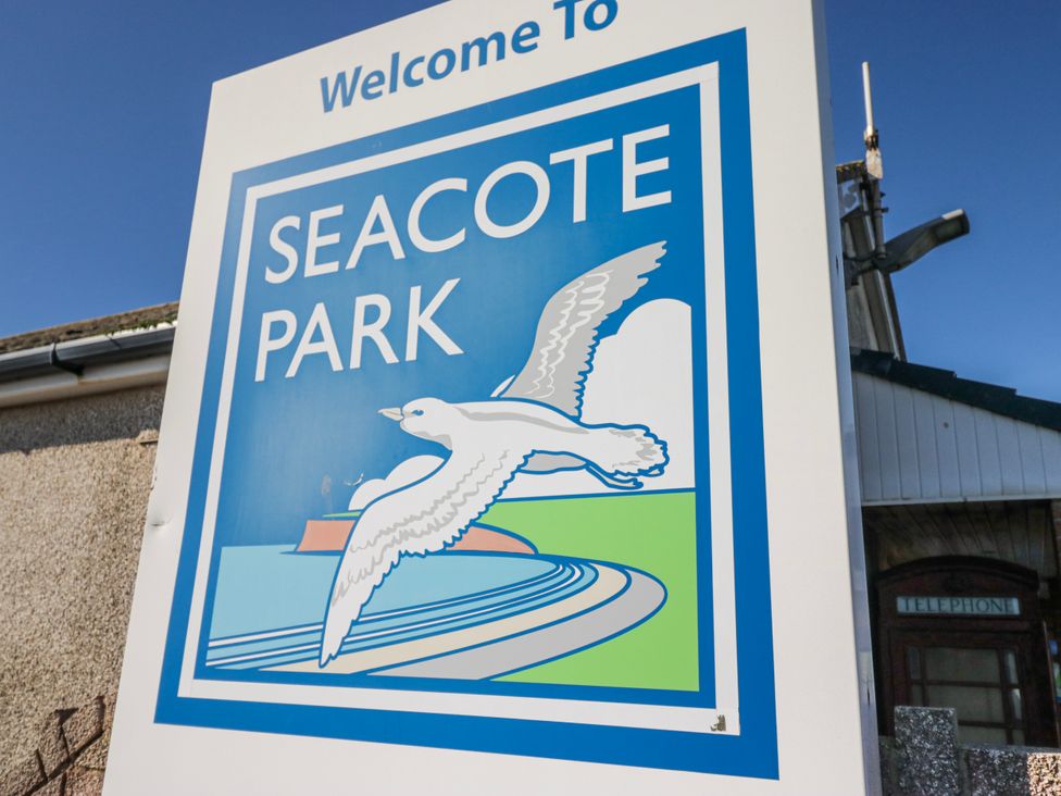 A sign welcoming visitors to Seacote Park located in St Bees
