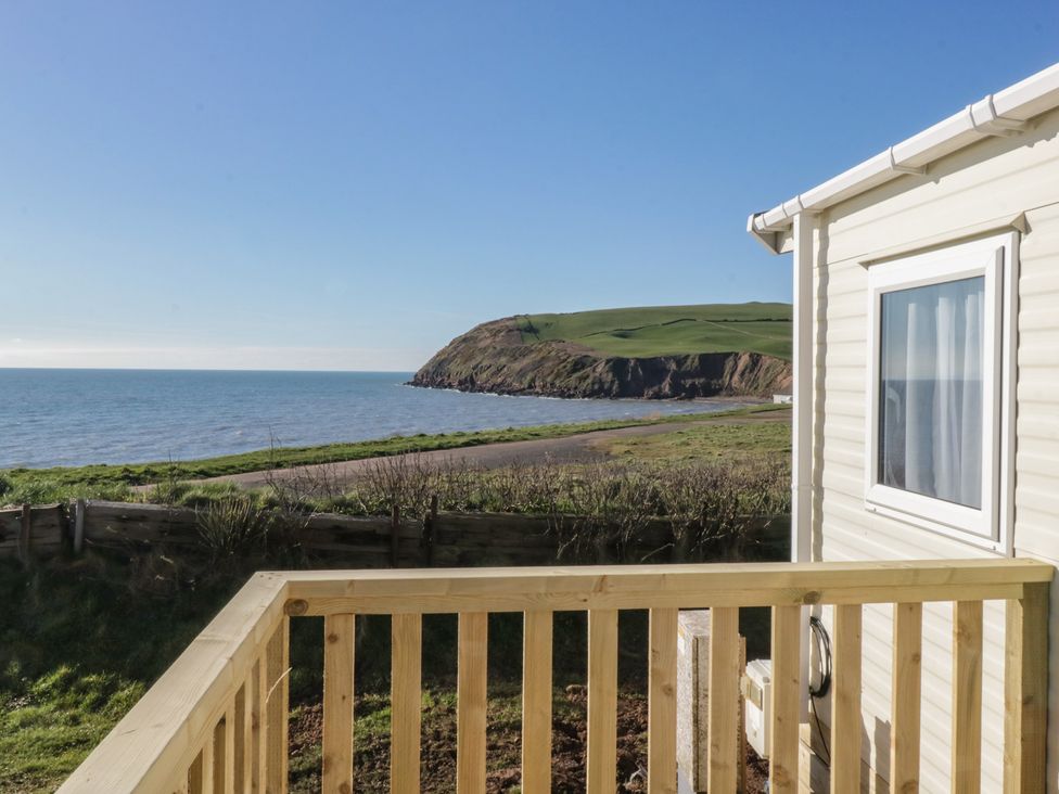 A view of the ocean and cliff from a balcony at Swift Brand (HOTEL SIDE) S4 St Bees