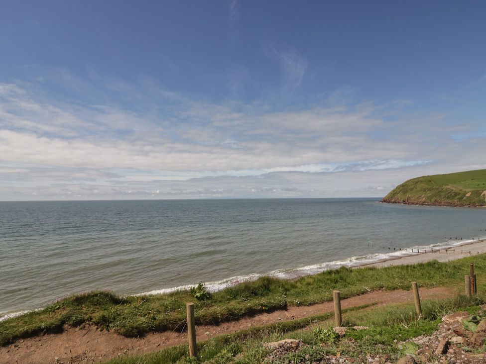A view of the ocean and shore at The Swift in St Bees