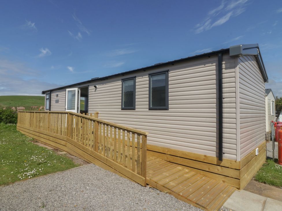 A mobile home with a ramp and steps at The Swift in St Bees