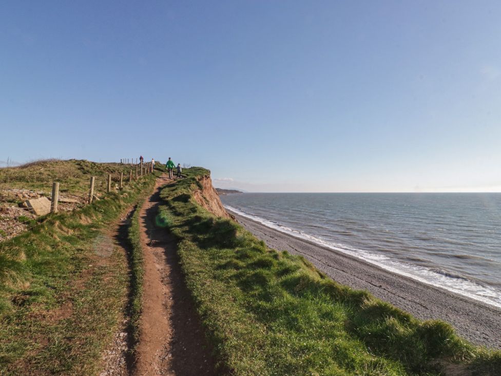 A path along a cliff overlooking the ocean at Swift Brand (3 Bed) (on Coniston) St Bees