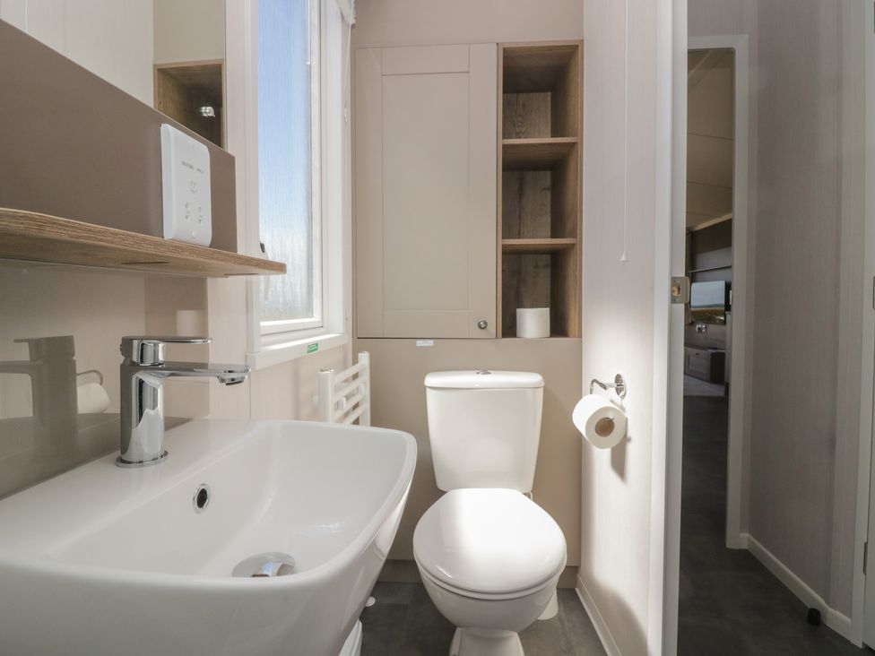 A bathroom with a sink and toilet at The Plover in St Bees
