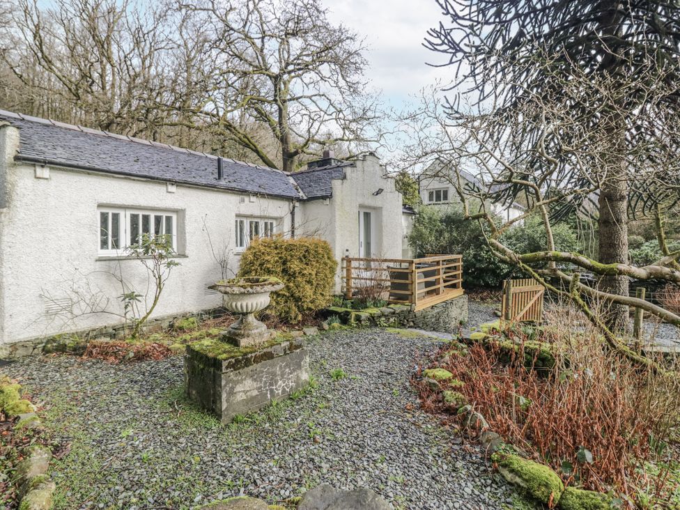 A cottage with garden features at The Dove Cot in Ambleside