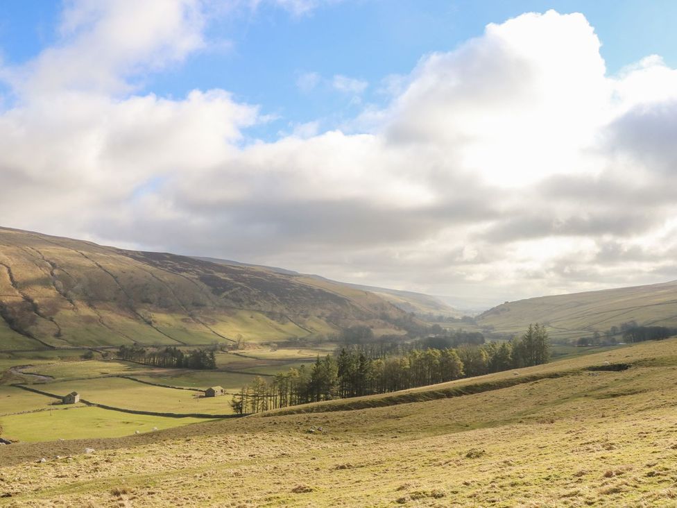 A landscape view of hills and fields at Litton Hall Barn Cottage Skipton