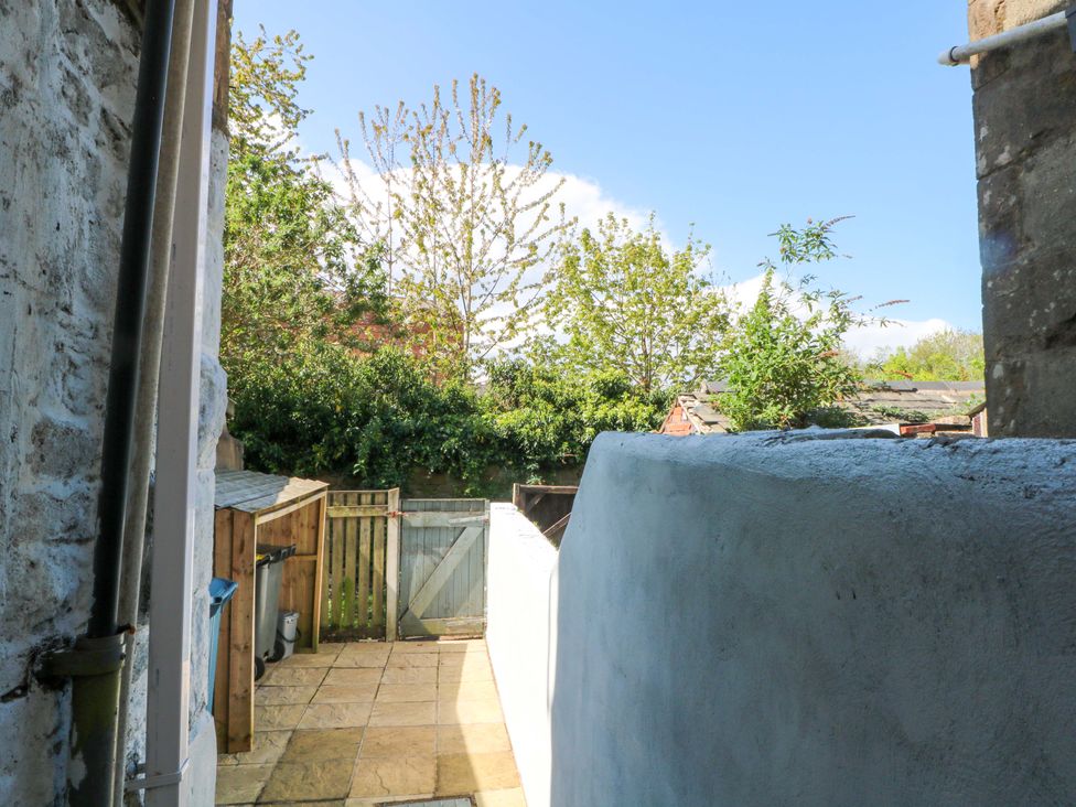 A garden view with a fence and plants at 4 Newton Terrace in Lancaster