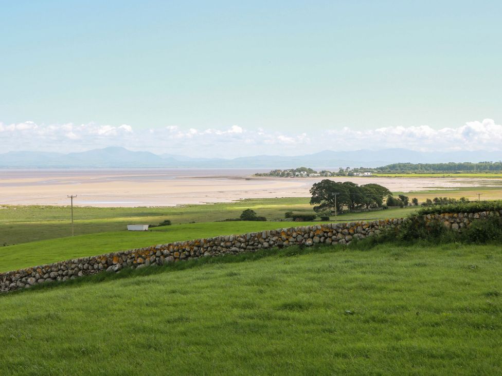 A landscape view showing a river and mountains at Wagtail Cottage in Southerness