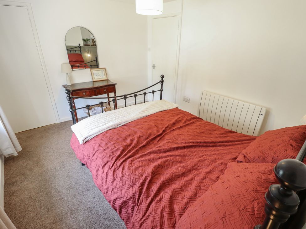 A bedroom with a bed and a dresser at 3 Rectory Row