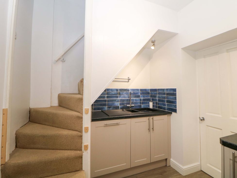 A kitchen with a sink and countertop at Nature’s Retreat in Matlock