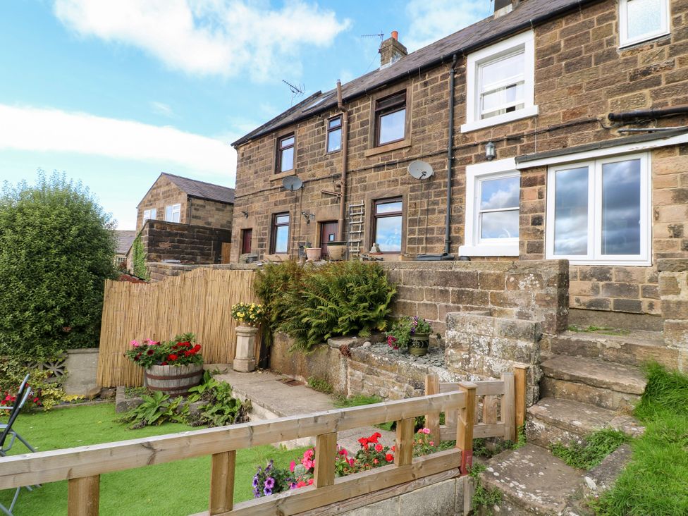 A house with a garden and steps at Nature’s Retreat in Holloway