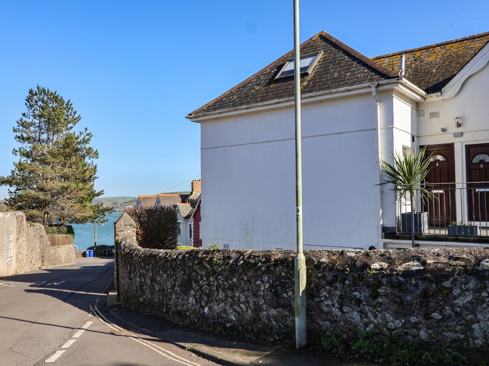 A house exterior with a road and trees at 3 The Elms in Salcombe