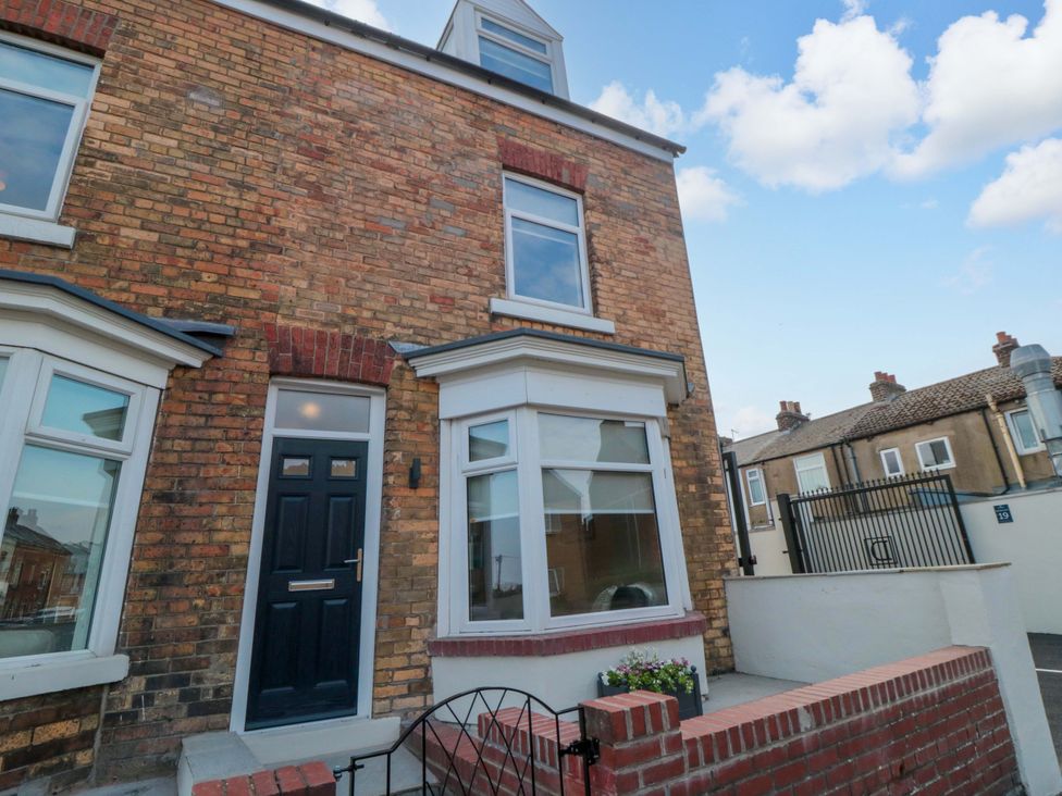 An exterior view of a house with a front door and windows at No.9 Trafalgar St West Scarborough