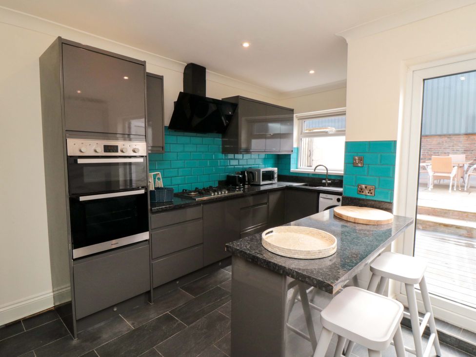 A kitchen with appliances and countertop at No.8 Trafalgar St West Scarborough