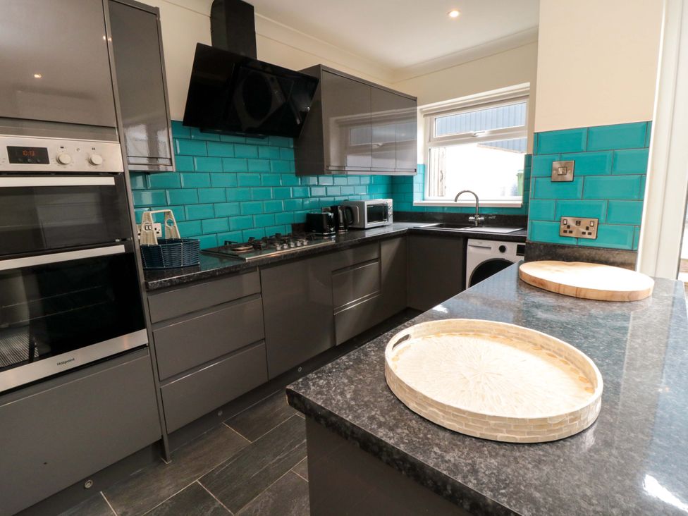A kitchen with modern appliances at No.8 Trafalgar St West in Scarborough