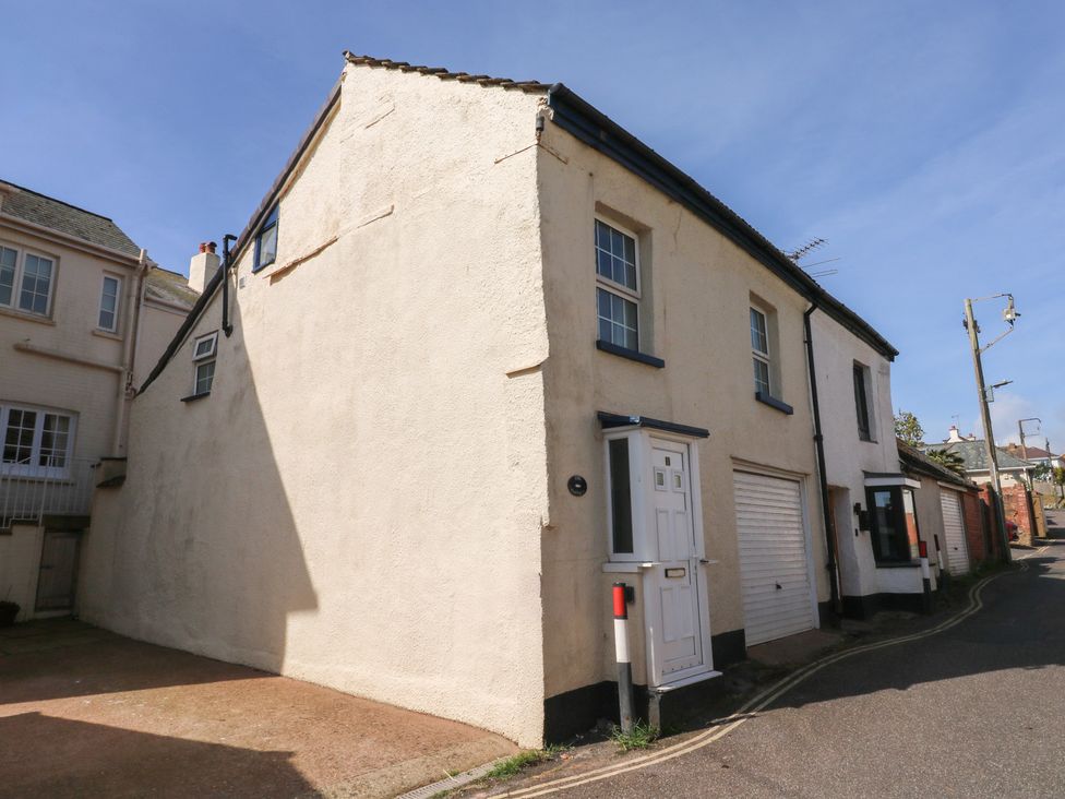 A house with windows and a garage at The Cottage Budleigh Salterton