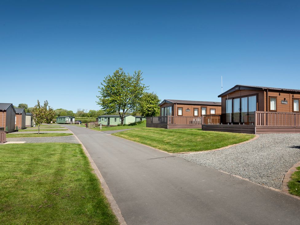 A view of cabins and a road in a recreational park at Tulip in Eardisland