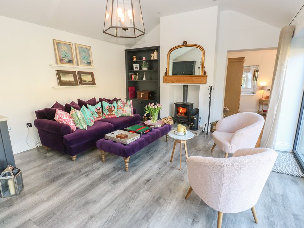 A living room with a sofa and coffee table at The Summerhouse in 
