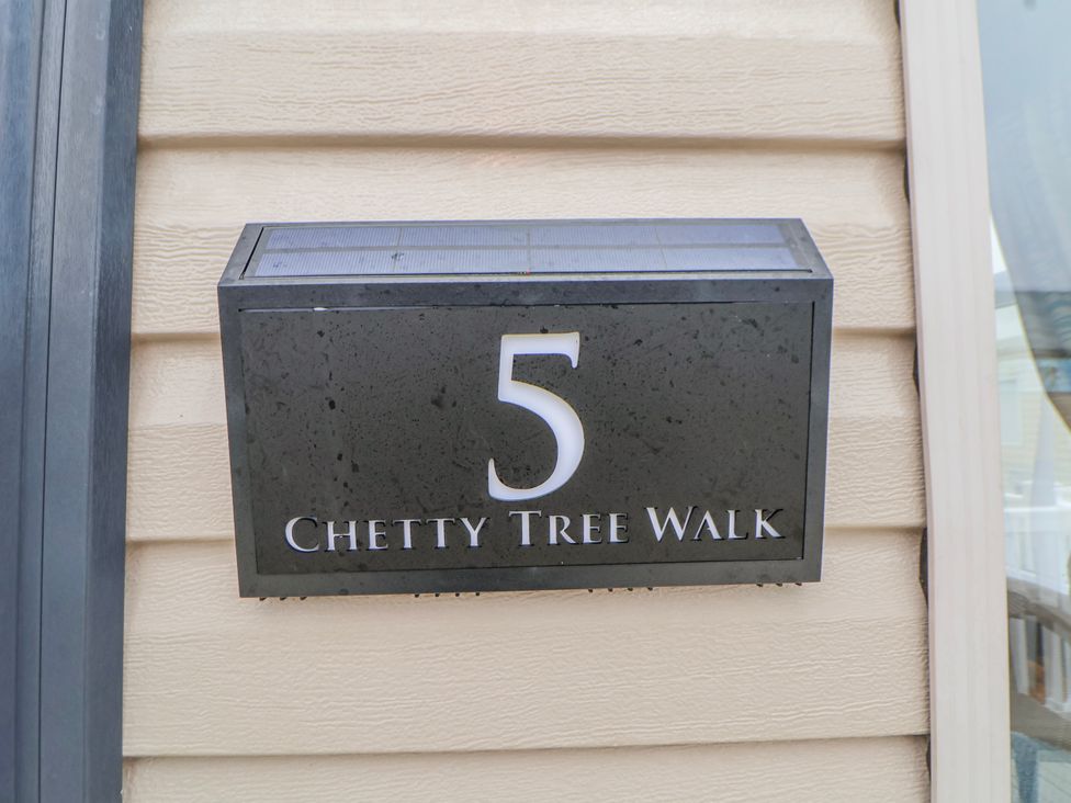 A house number display showing 5 Chetty Tree Walk