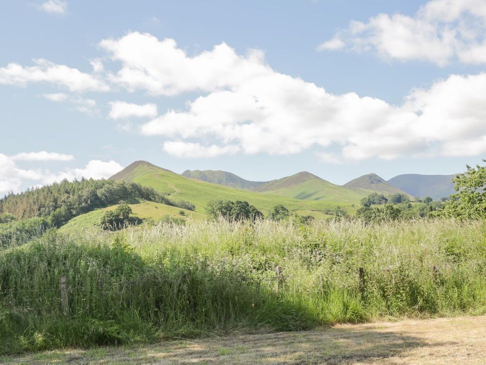 Mountains and green fields at No 8 - Farmhouse Retreat in Keswick