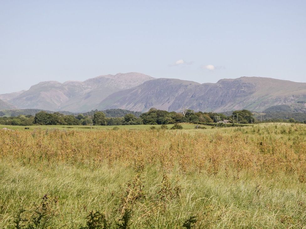 A landscape with mountains and fields at Yewbarrow in Seascale