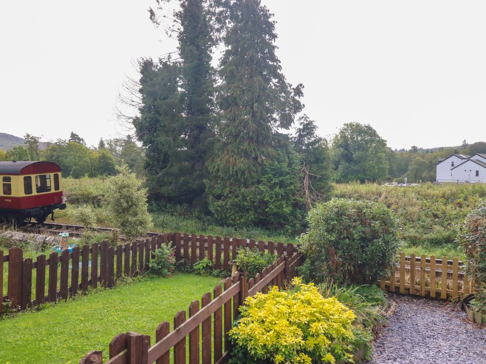 View of a train carriage and garden at 8 Railway Cottages Ulverston