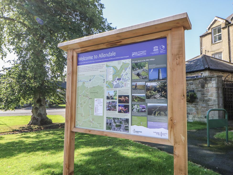 A welcome sign with a map and information at Dove Cottage in Hexham