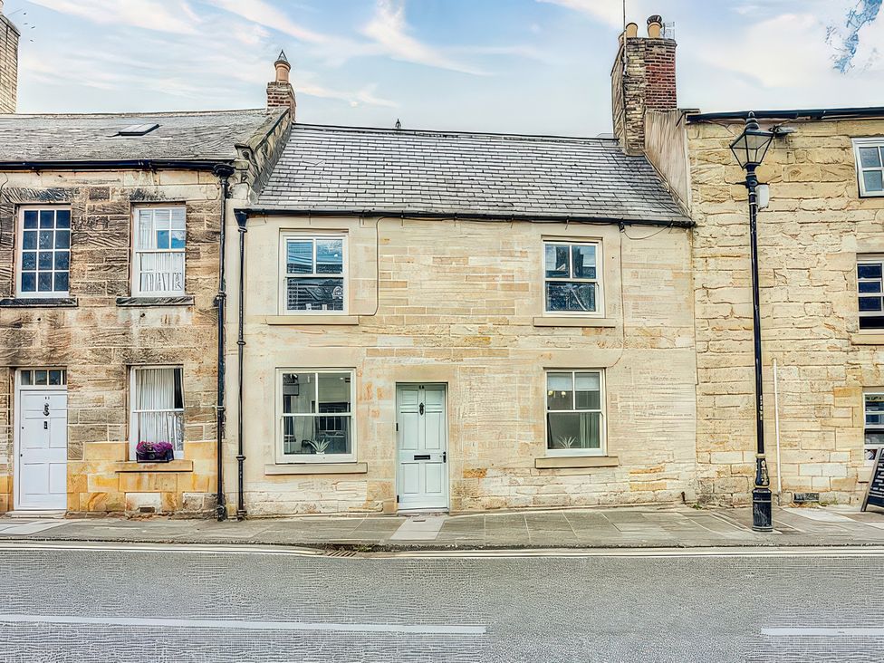 A house with windows and a door on a street at 20 Bridge Street in Morpeth