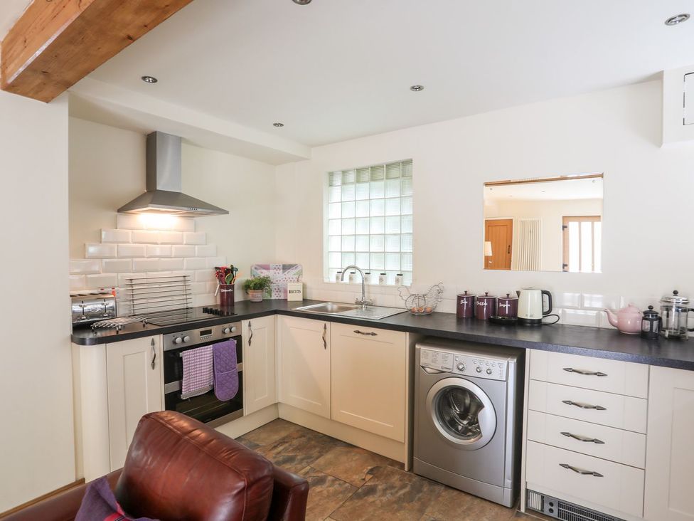 A kitchen with appliances and counter space at Llys Elen Caernarfon