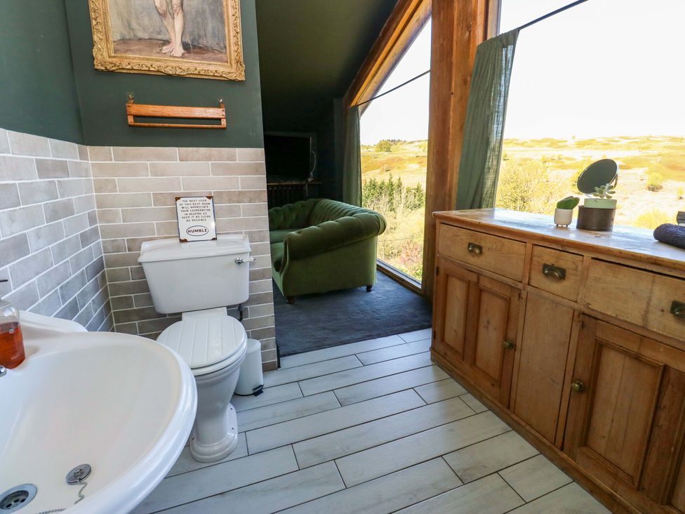 A bathroom with a sink and toilet at Rocks Cottage in Halifax