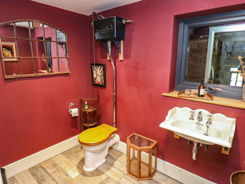 A bathroom with a sink and toilet at Rocks Cottage Halifax