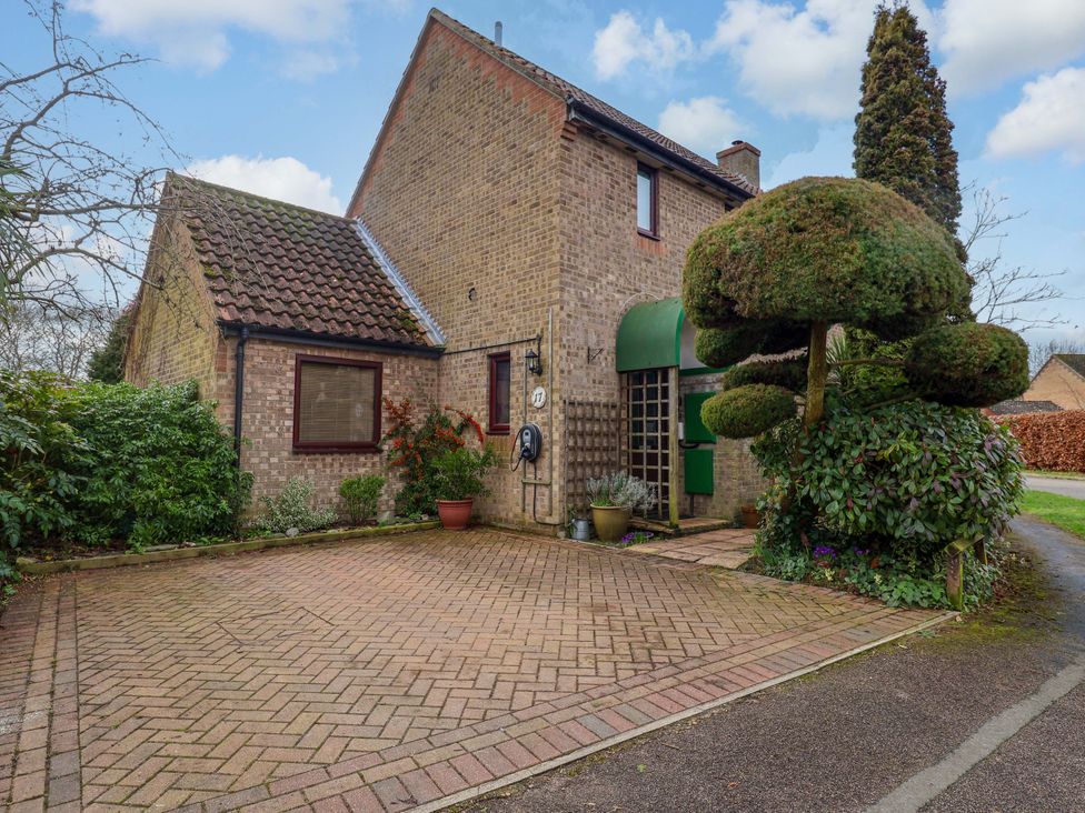 A house exterior with a driveway and garden at 17 Demesne Gardens Ipswich