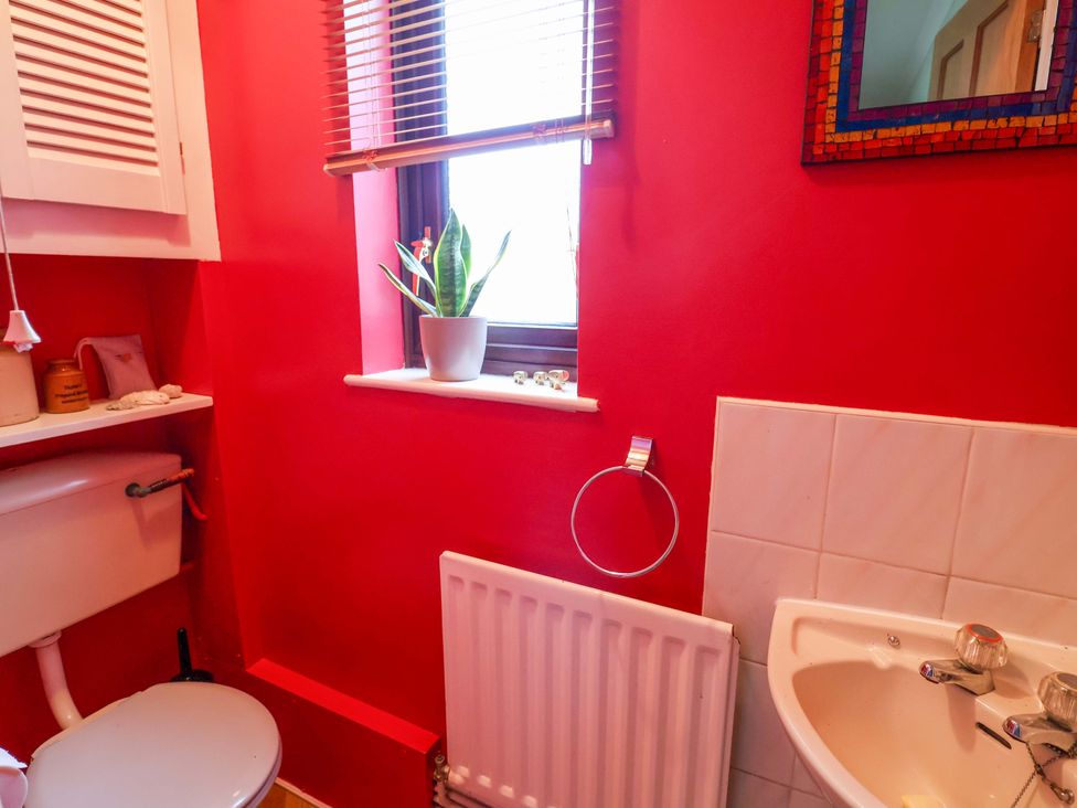 A bathroom with a sink and toilet at 17 Demesne Gardens Ipswich