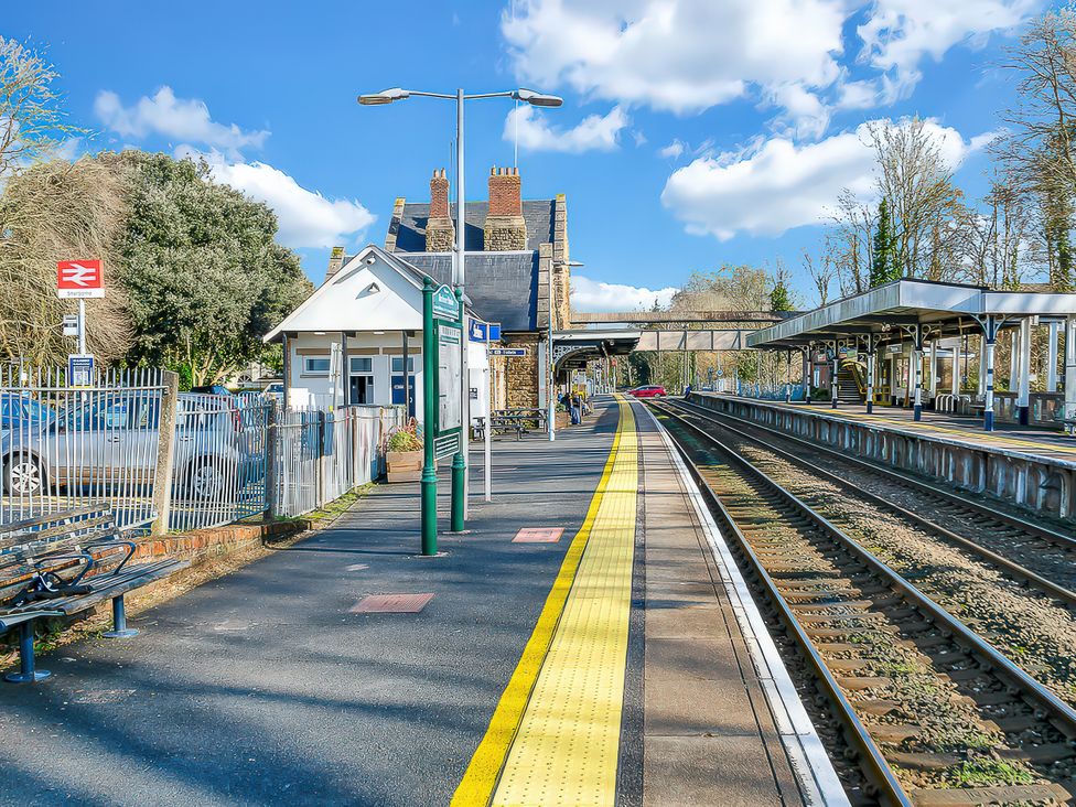 A train station with platforms and tracks at 40 Raleigh Court Sherborne