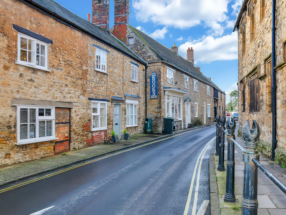 A street view with buildings and a sign at 40 Raleigh Court in Sherborne