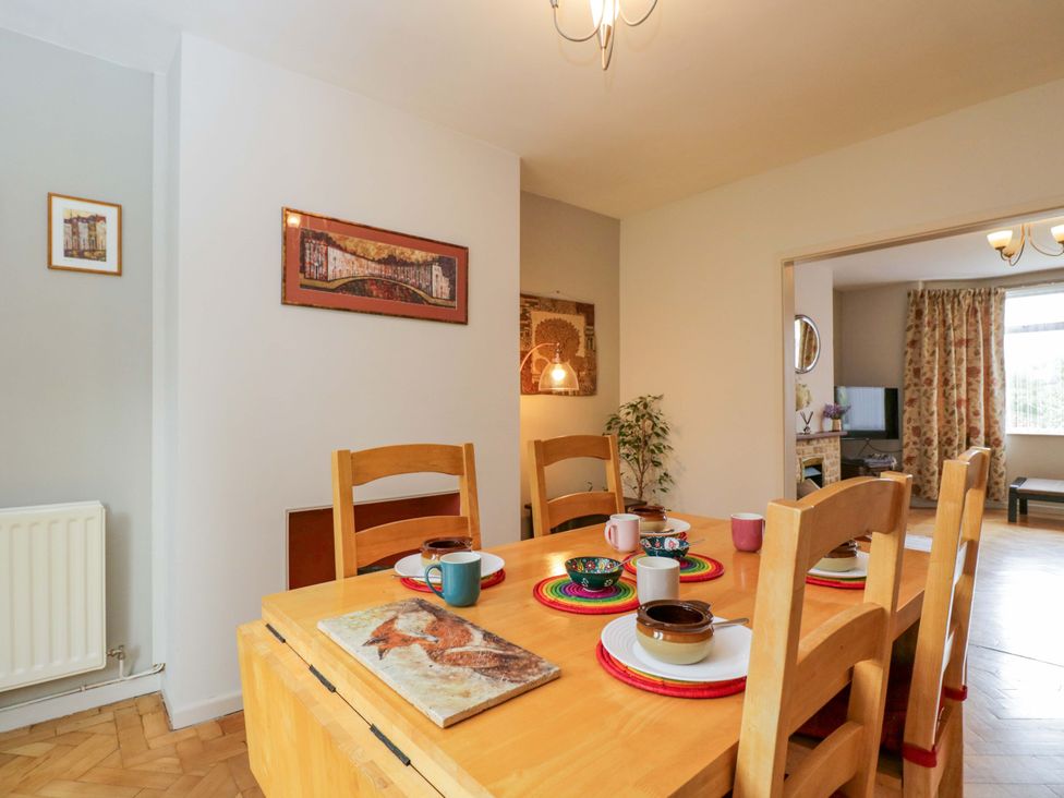 A dining room with a table set for tea at Highbury in Bath