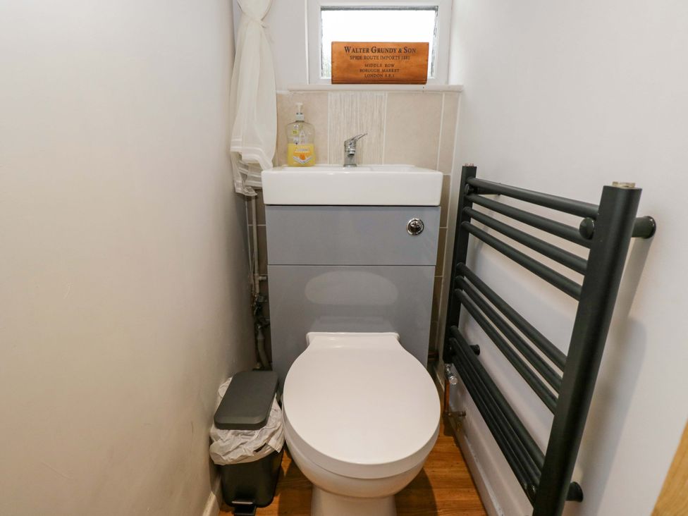 A bathroom with a toilet and sink at Highbury in Bath