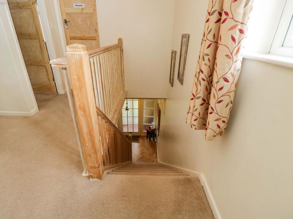 Stairs leading to an open hallway at Highbury in Bath