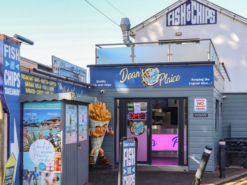 Dean's Place fish and chips takeaway with sign at Dawlish Warren
